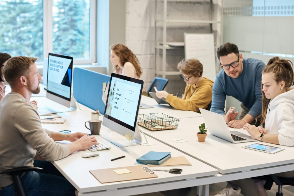 People working at their desks.