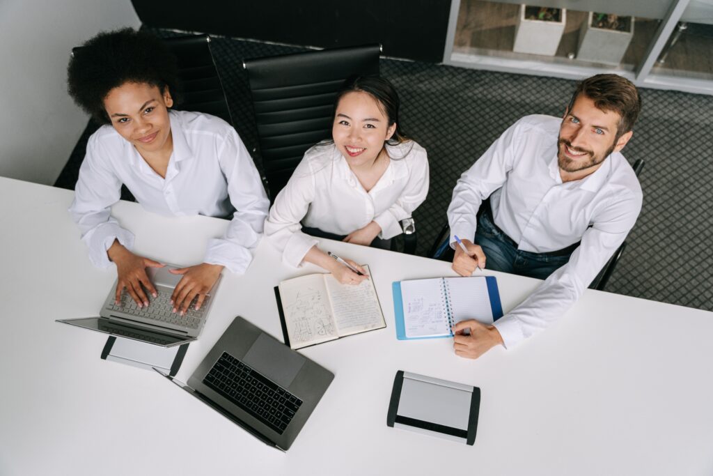Three people in the office.